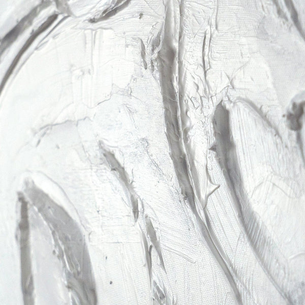 Detailansicht strukturierter Oberfläche mit Relief in Weiß