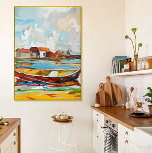 Wohnraum mit aufgehängtem Bild über einer Kücheneinrichtung