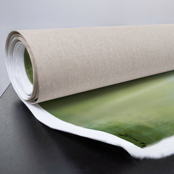 gerollte Leinwand mit Waldbild in Grün und Blau