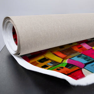 Leinwandbild mit bunten Häusern auf dunklem Grund