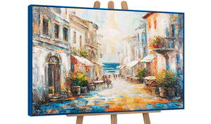 Stadtgemälde am Meer – Acrylbild mit blauem Rahmen