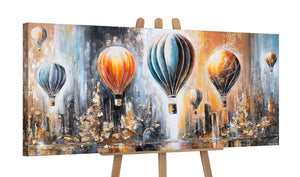 Leinwandbild auf Staffelei mit Heißluftballons und Stadt
