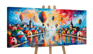 Leinwandbild auf Staffelei mit bunter Stadtlandschaft