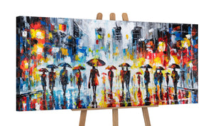 Acrylbild Stadt mit Menschen unter Regenschirmen auf Staffelei
