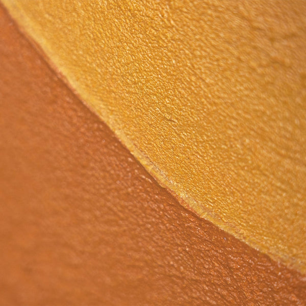 Reliefkunst Sonnenmotiv Terrakotta sanft